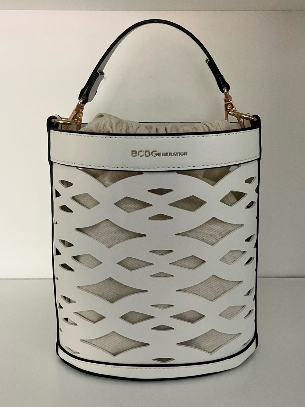 NWT BCBGeneration White Laser-Cut Bucket Tote with Black Trim